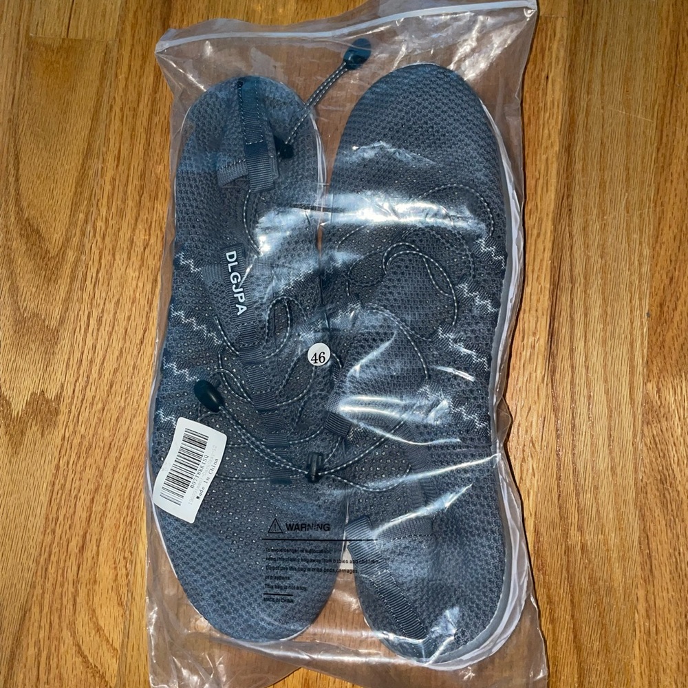 Size 12 (fit like a size 13) DLGJPA Water shoes. Never worn.